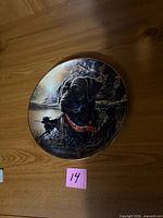 Front view of dog-themed collector plate
