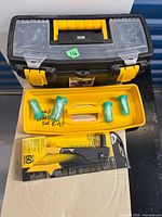 Overall lot showing toolbox, rivet tool kit, three green containers