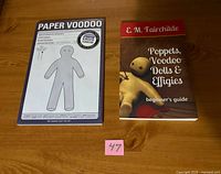 Front of Paper Voodoo pad and beginner's guide book