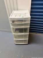 Full view of white 5-drawer plastic storage bin