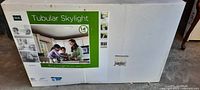 Front of sealed box displaying ODL Tubular Skylight graphics and size