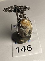 Front view showing jasper cabochon and ornate silverwork