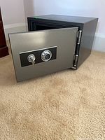 Safe door open showing interior