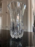 Full view of clear crystal vase showing shape and cuts