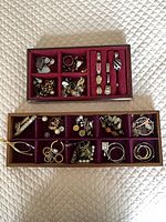 Both trays showing full assortment of jewelry