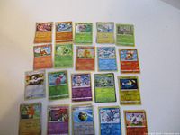 Overview of all 20 holographic cards laid out in four rows of five