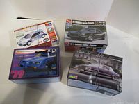 All four model car kit boxes overview
