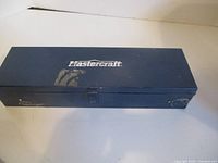 Closed blue Mastercraft metal drill bit case