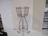 Full view of metal plant stand, showing overall structure