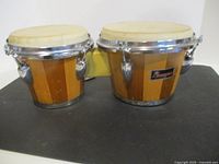 Front view of connected Paragon wooden bongo drums