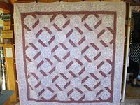 Full view of quilt front showing pattern and borders