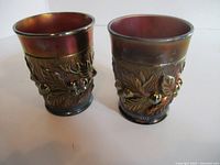 Pair of iridescent Northwood carnival glass tumblers front view