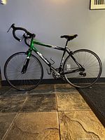 Left side view of Miele Latina road bicycle showing frame, wheels, drivetrain