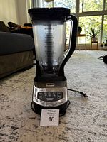 Full view of Ninja blender with pitcher and lid