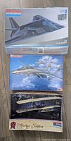 Group shot of three boxed aircraft model kits