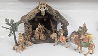 Full nativity scene with stable, Holy Family, animals, palm, shepherd, Wise Men