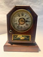 Front view of Seth Thomas rosewood cottage mantel clock
