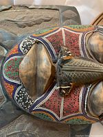 Close-up of beaded lower face and nose section