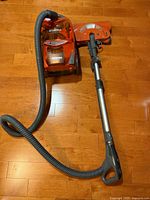 Full view of Kenmore Progressive canister vacuum with hose, wand and power head