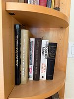 Shelf showing seven vintage philosophy and mind studies hardcovers