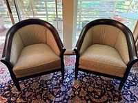 Front view of both barrel back chairs on rug