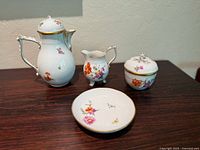 Group shot of all four porcelain pieces