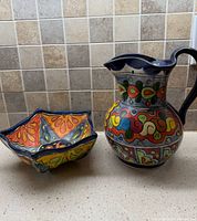 Pitcher and bowl side by side showing overall size, shape and colours