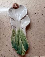 Front view of onion-shaped ceramic serving dish