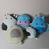 Group shot of five Squishmallows plush toys