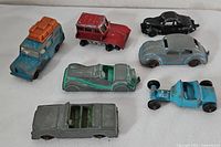 Group shot of all seven Tootsietoy vehicles