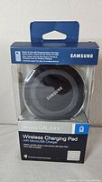 Front of sealed Samsung Galaxy wireless charging pad retail box