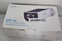 Front of box showing Wansview 3MP 2K solar security camera