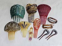 Group shot of all thirteen celluloid hair accessories