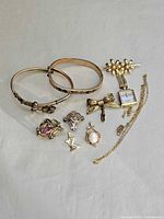 Group shot of all nine gold-filled jewelry pieces