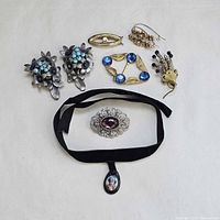 All ten jewellery pieces arranged for overview