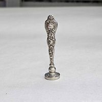 Full front view of wax seal stamp standing upright