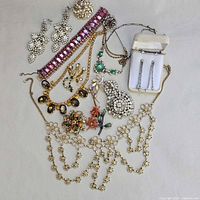 All ten jewelry pieces laid out together