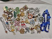 Group view of all jewelry pieces on cloth