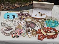 Overall view of assorted vintage jewelry pieces