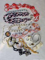 Group shot of entire jewelry lot spread out