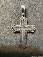 Front of sterling silver cross pendant