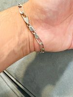 Bracelet on wrist showing link style