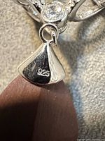 Close-up of 925 stamp on pendant cap