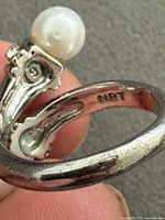 Close-up of ART hallmark inside ring band