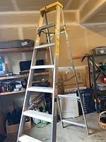 Full view of 8 ft Davidson aluminum step ladder in garage