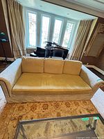 Front view of ivory floral 3-seat sofa showing cushions and fabric pattern