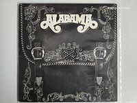 Front cover showing Alabama logo and saddlebag artwork