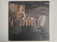 Front album cover with artist and title visible