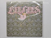 Front jacket of Bee Gees Main Course LP in protective sleeve