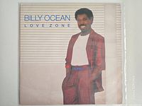 Front sleeve showing album artwork and protective outer poly sleeve